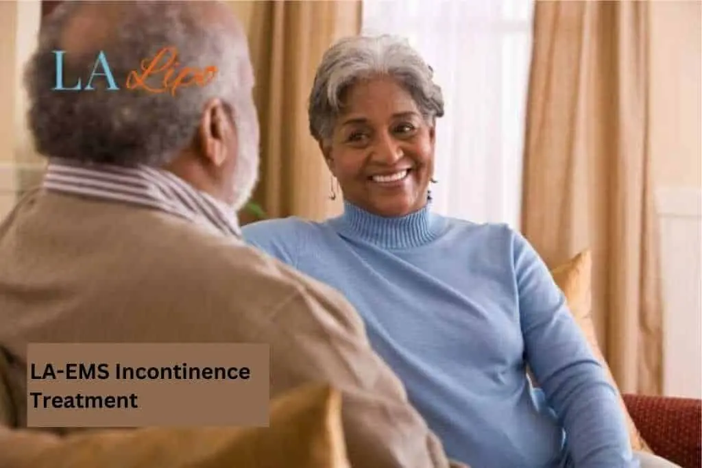 Couple sat smiling at each other - LA-EMS treatment Shipston-on-Stour